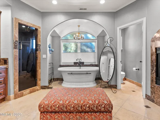 a kitchen with stainless steel appliances granite countertop a refrigerator sink and cabinets