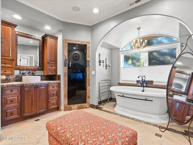a bathroom with a bathtub and shower