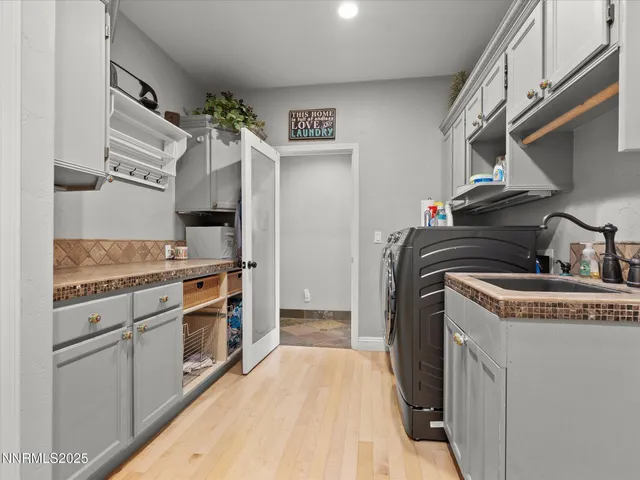 a view of a porch with furniture and a fire pit