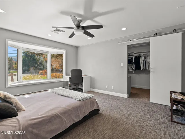 an aerial view of a house with a garden