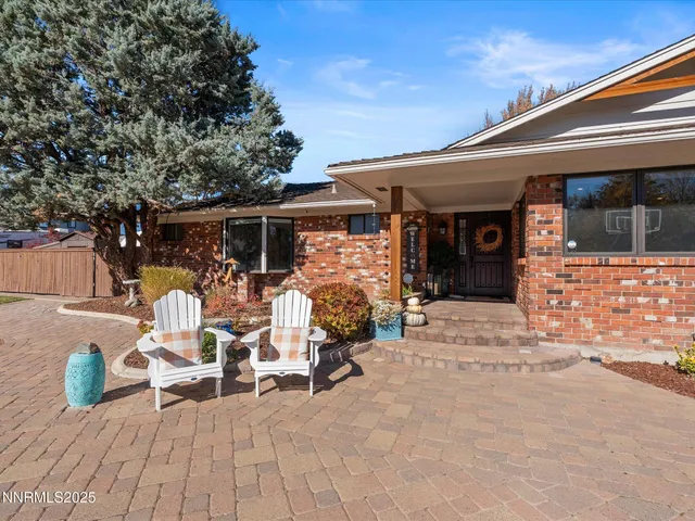 a large kitchen with stainless steel appliances lots of counter top space