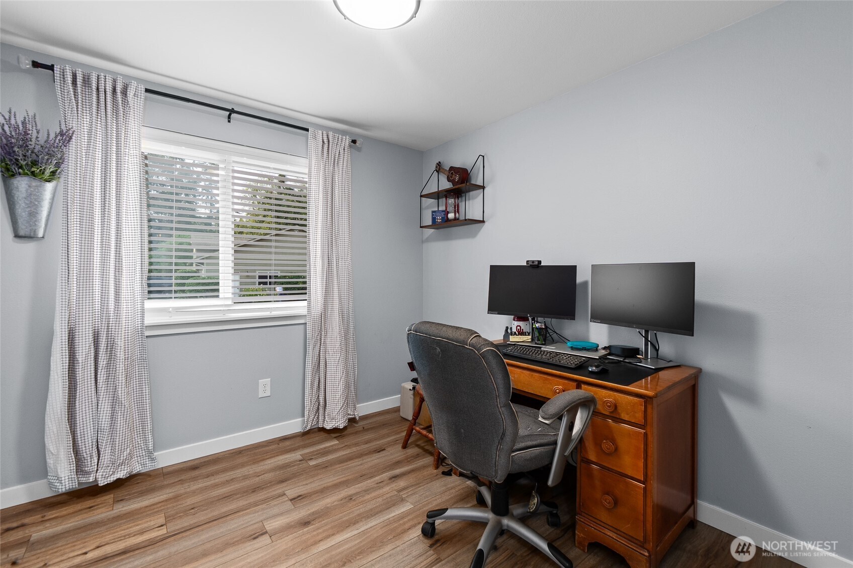 16115 243rd Street East Graham, WA 98338 - Photo 15 of 38 a view of a workspace with furniture and a window
