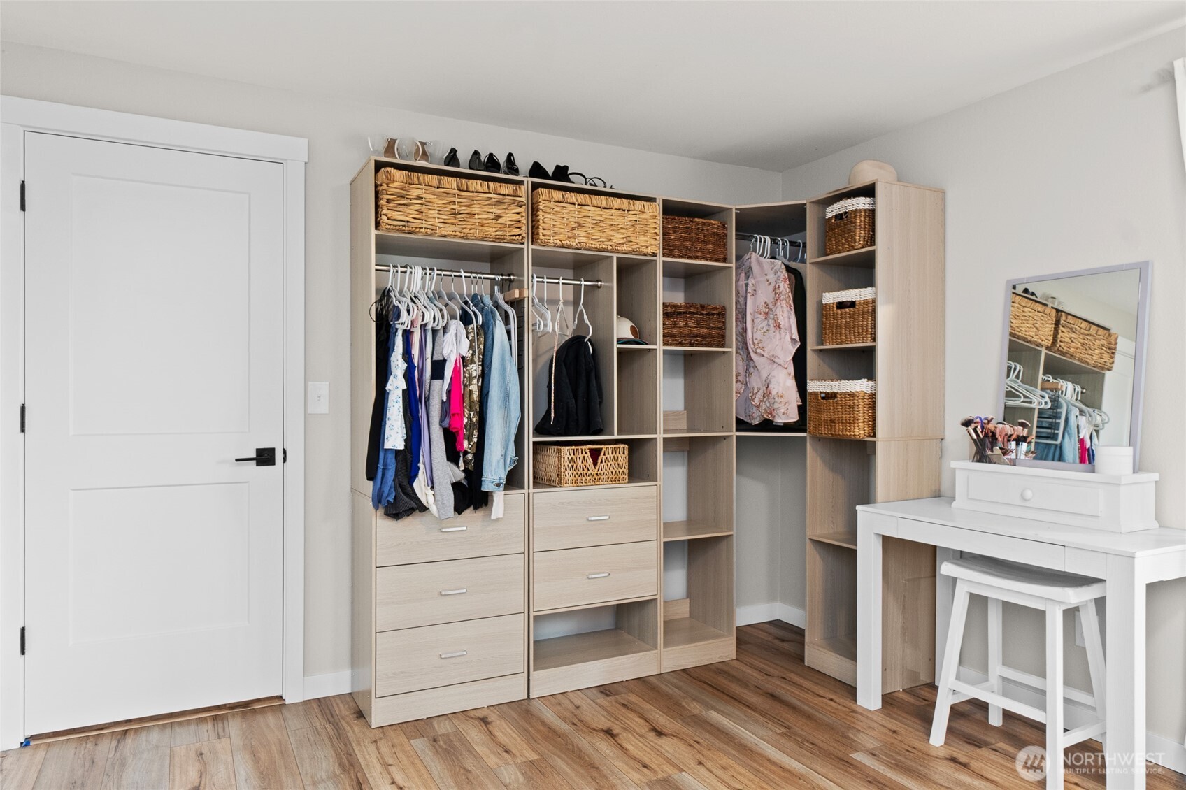 16115 243rd Street East Graham, WA 98338 - Photo 18 of 38 a view of walk in closet with clothes and shoes