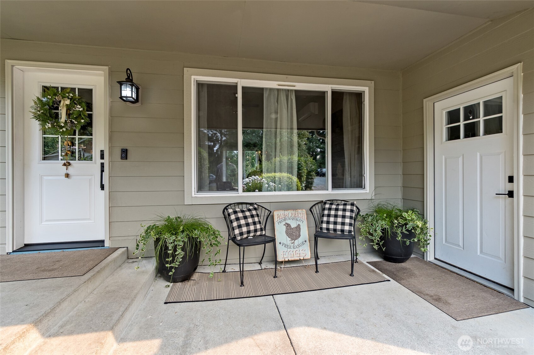 16115 243rd Street East Graham, WA 98338 - Photo 2 of 38 a view of chair and table in back yard of the house