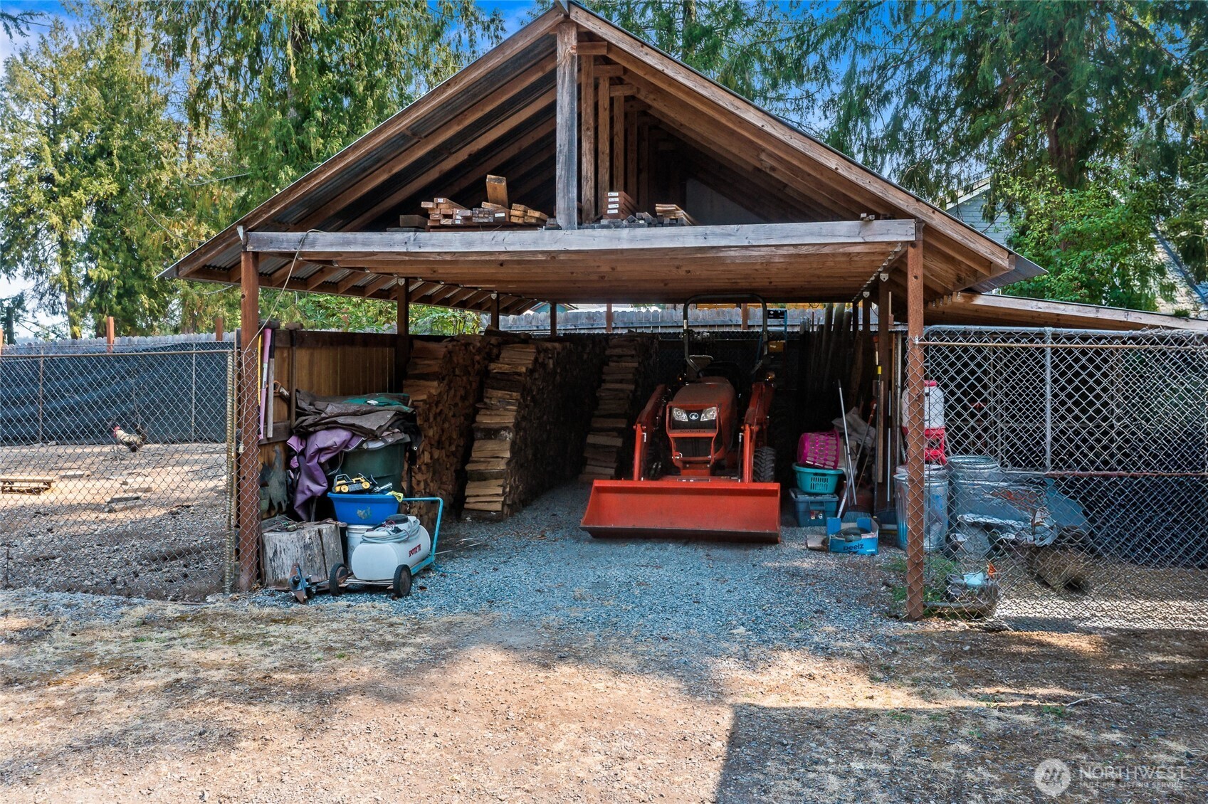 16115 243rd Street East Graham, WA 98338 - Photo 26 of 38 a view of a car park in front of a house
