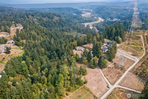 an aerial view of residential house with outdoor space