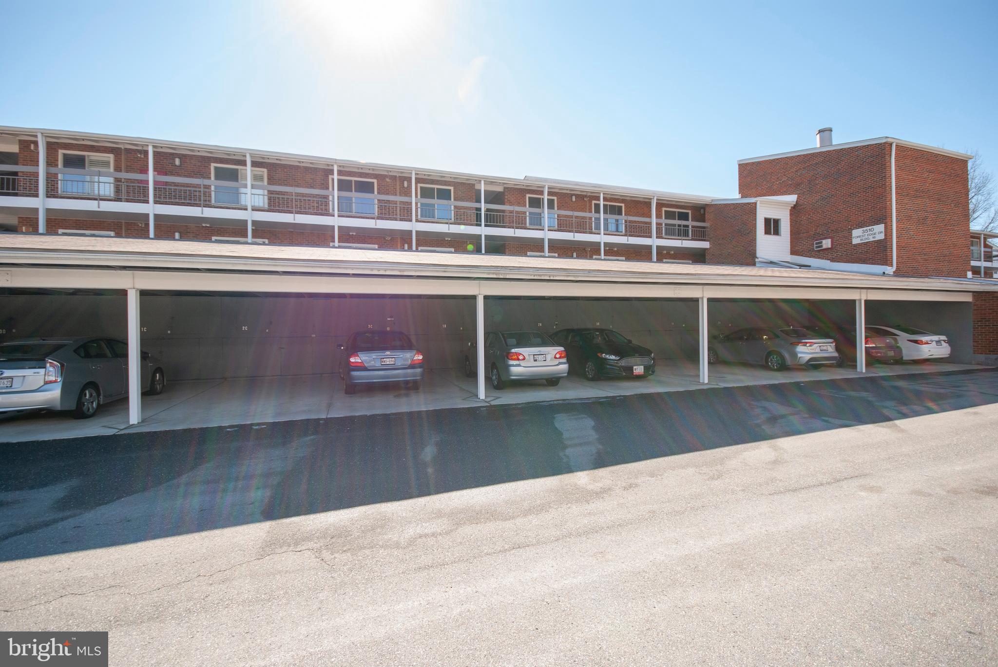3510 Forest Edge Drive, Unit 2D Silver Spring, MD 20906 - Photo 2 of 5 Exterior, Covered parking with additional storage