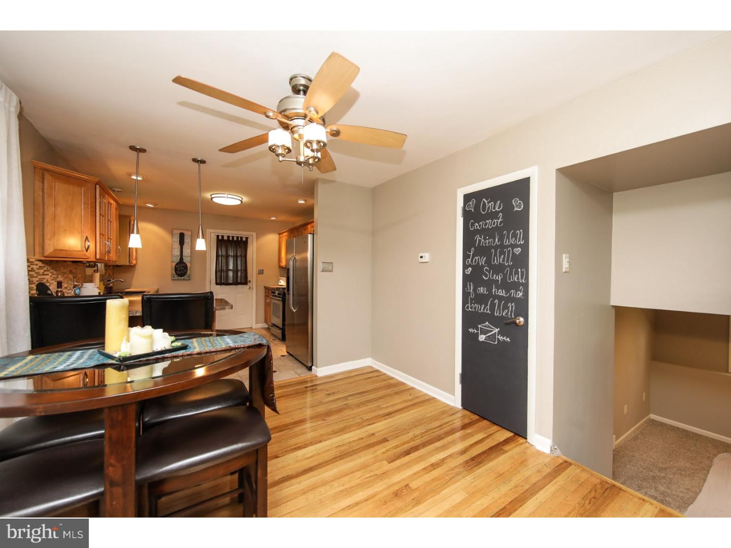 754 Spruce Road Warminster, PA 18974 - Photo 11 of 25 a view of kitchen with kitchen island microwave and stove
