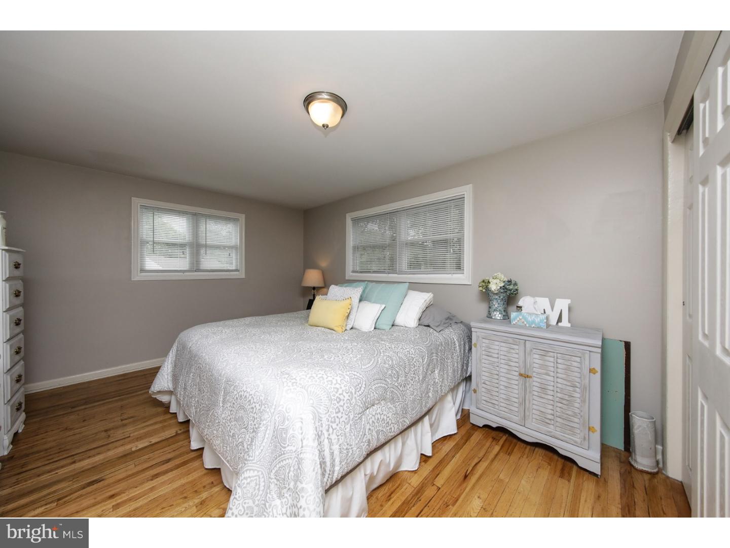 754 Spruce Road Warminster, PA 18974 - Photo 15 of 25 a bedroom with a bed and a window