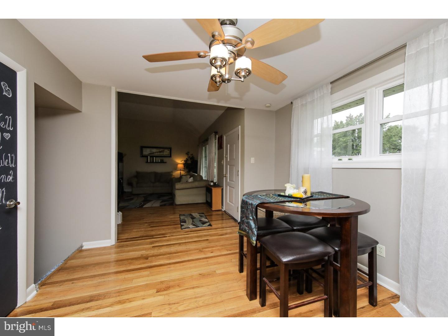 754 Spruce Road Warminster, PA 18974 - Photo 10 of 25 a view of a dining room with furniture window and wooden floor