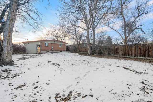 a view of snow on the side of the road