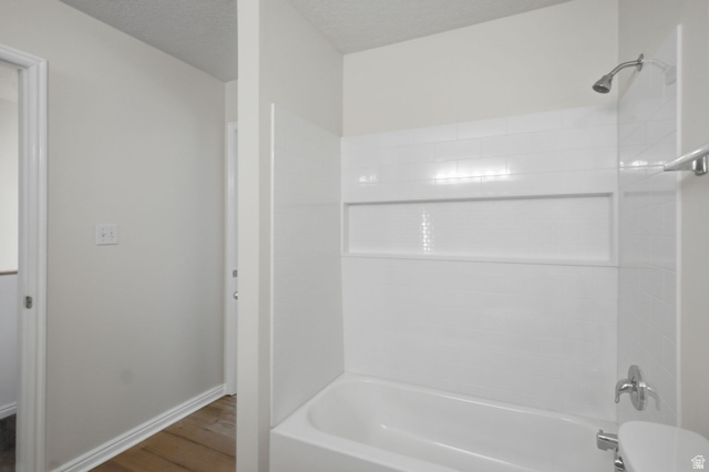 794 East 950 S Street Provo, UT 84606 - Photo 20 of 28 White subway tile surround with recessed niche and chrome fixtures