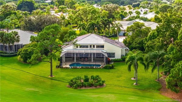 a view of a house with a big yard