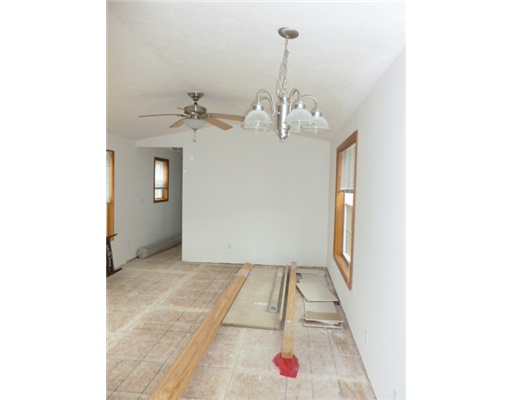 Living Room. living and dining area showing materials to be installed by buyer