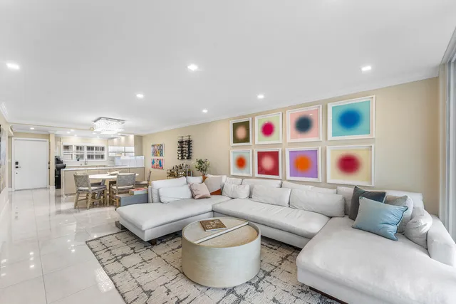 a living room with furniture and a rug