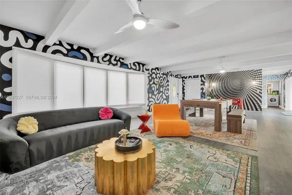 a living room with furniture and a couch