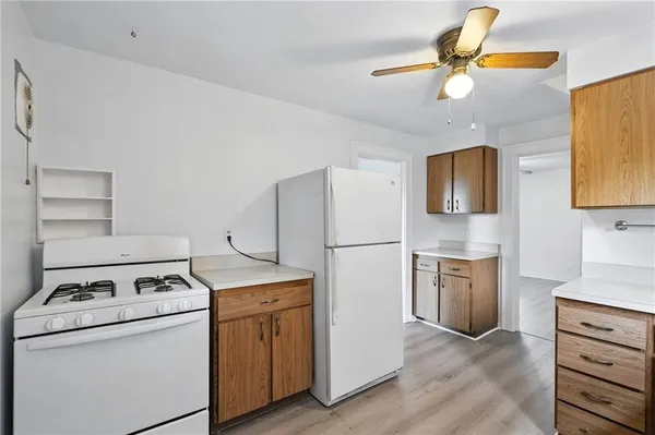 a view of storage and utility room with washer and dryer