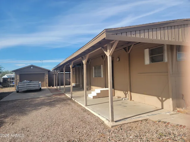 a picture of a bench in an empty room