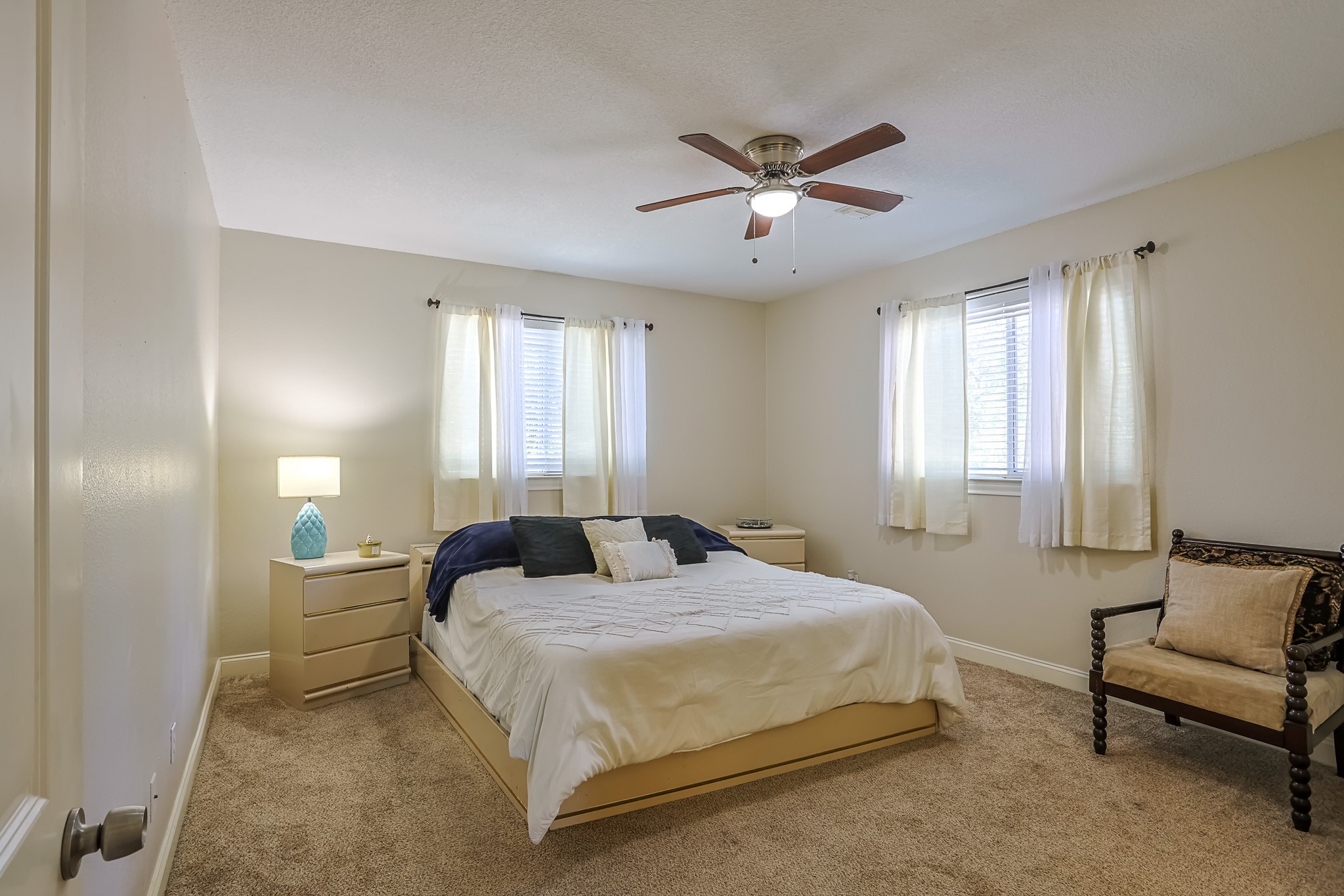 30119 West Geneva Drive Spring, TX 77386 - Photo 32 of 35 Peaceful secondary bedroom with dual windows, soft carpeting, and plenty of natural light
