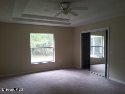 4470 Windsor Court Mims, FL 32754 - Photo 7 of 14 master_bedroom