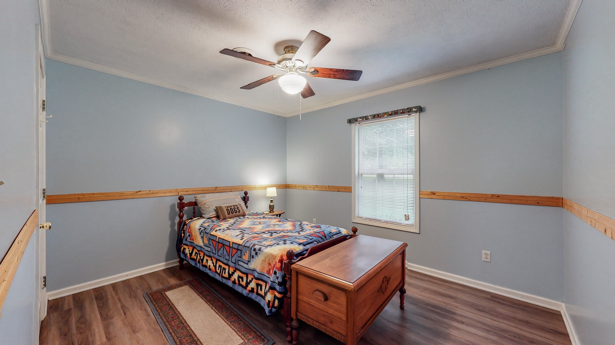 1243 White Road Bon Aqua, TN 37025 - Photo 17 of 42 a bedroom with bed and wooden floor