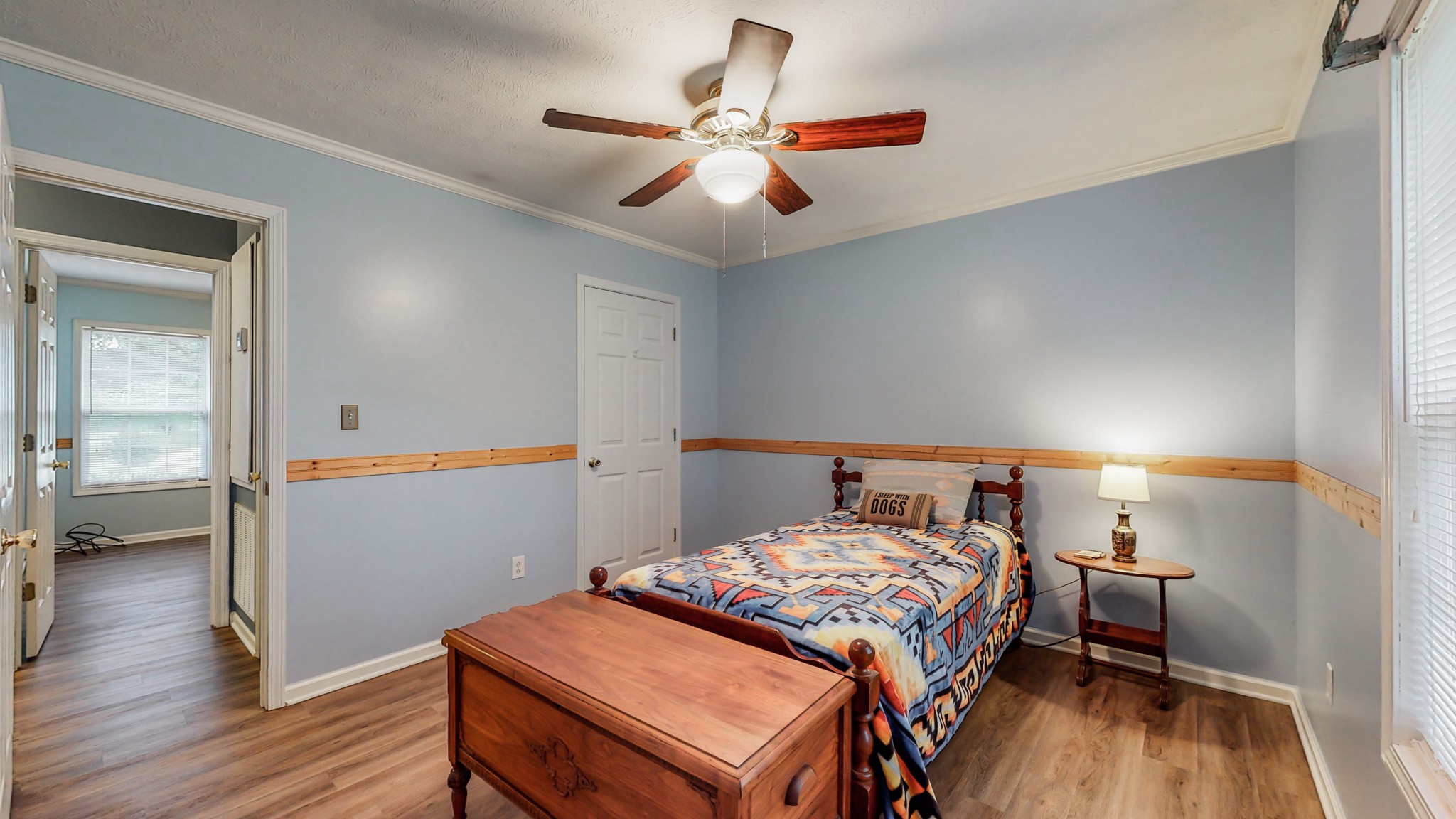1243 White Road Bon Aqua, TN 37025 - Photo 18 of 42 a bedroom with a bed and wooden floor