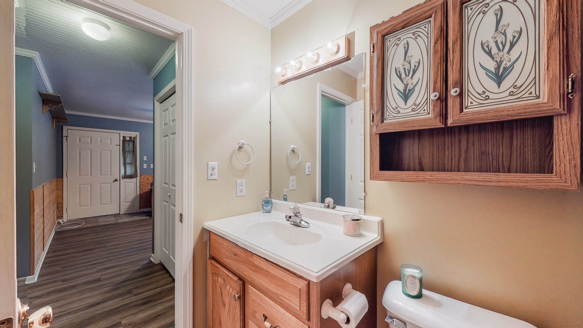 1243 White Road Bon Aqua, TN 37025 - Photo 20 of 42 a bathroom with a sink a vanity and a mirror