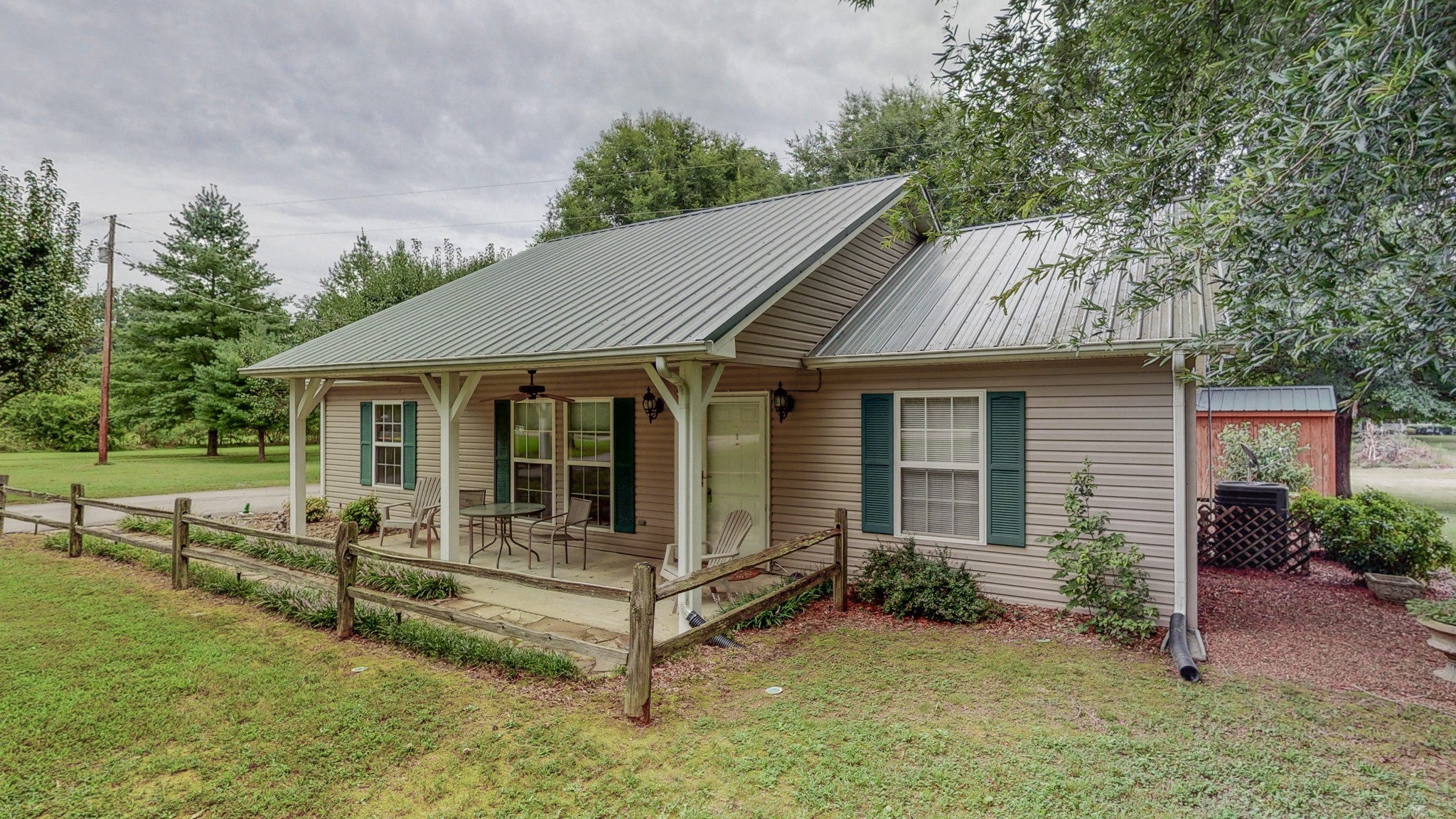 1243 White Road Bon Aqua, TN 37025 - Photo 3 of 42 front view of a house with a yard