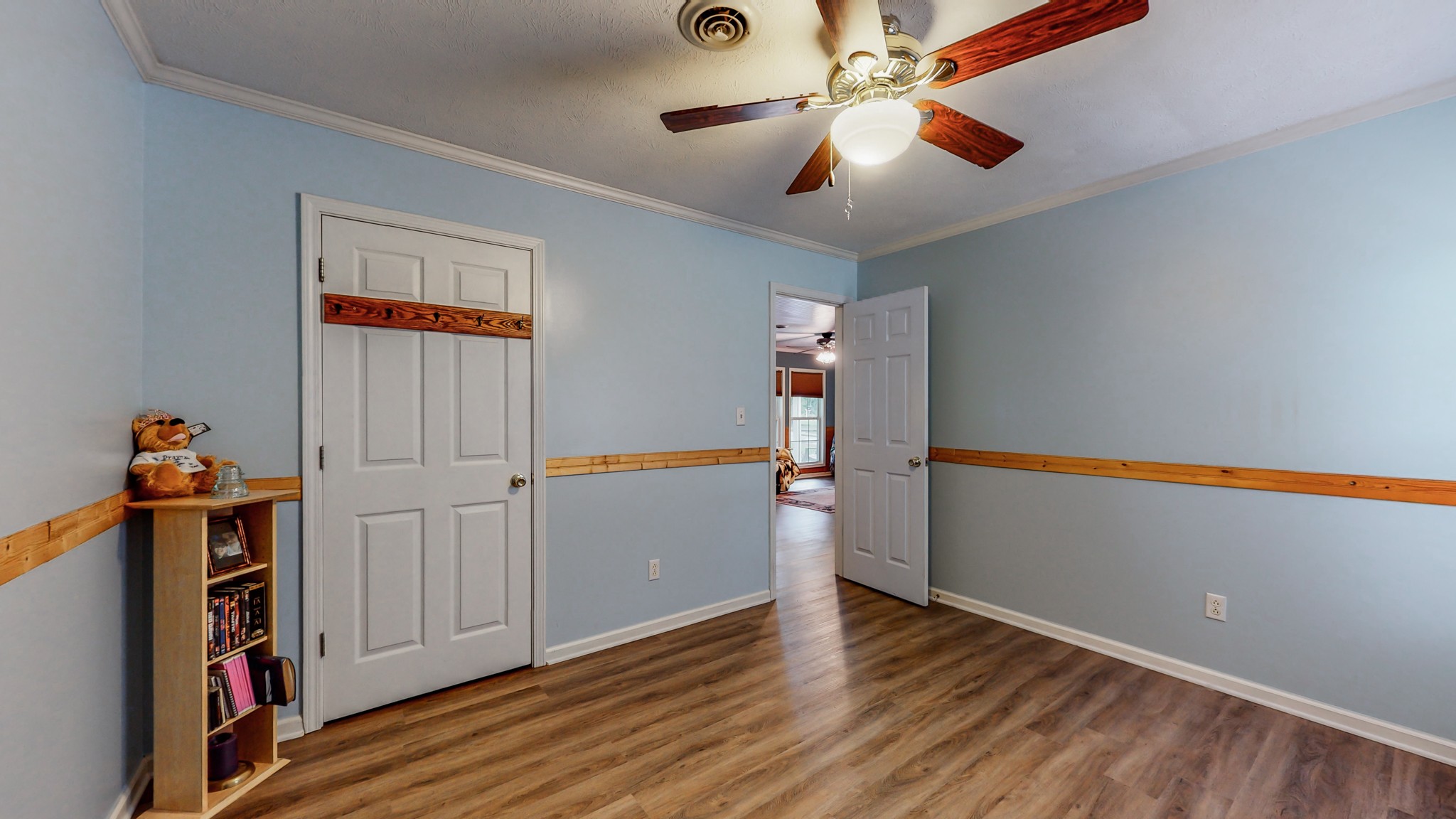 1243 White Road Bon Aqua, TN 37025 - Photo 24 of 42 a view of an empty room with wooden floor
