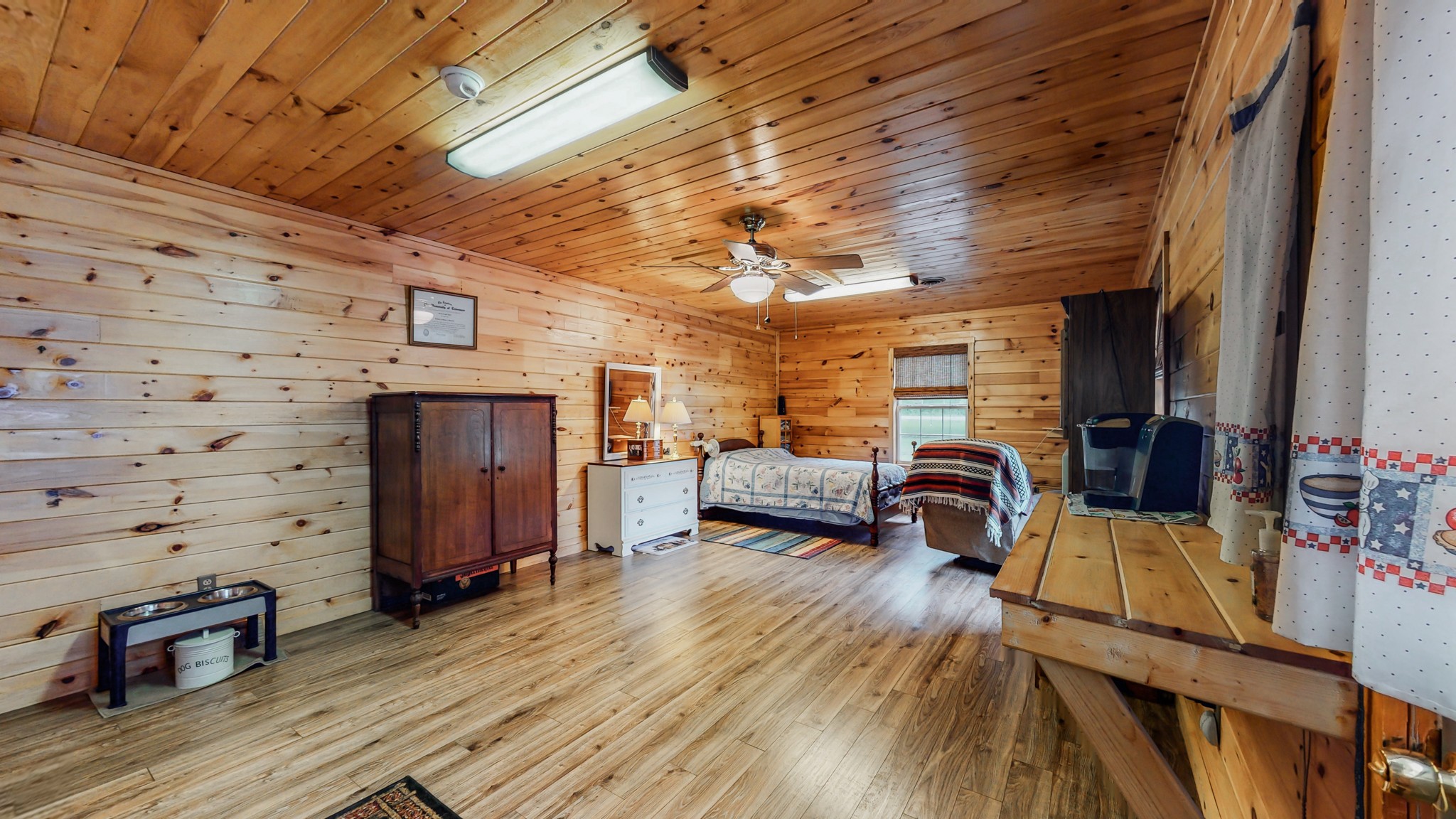 1243 White Road Bon Aqua, TN 37025 - Photo 27 of 42 a view of a livingroom with furniture and a ceiling fan