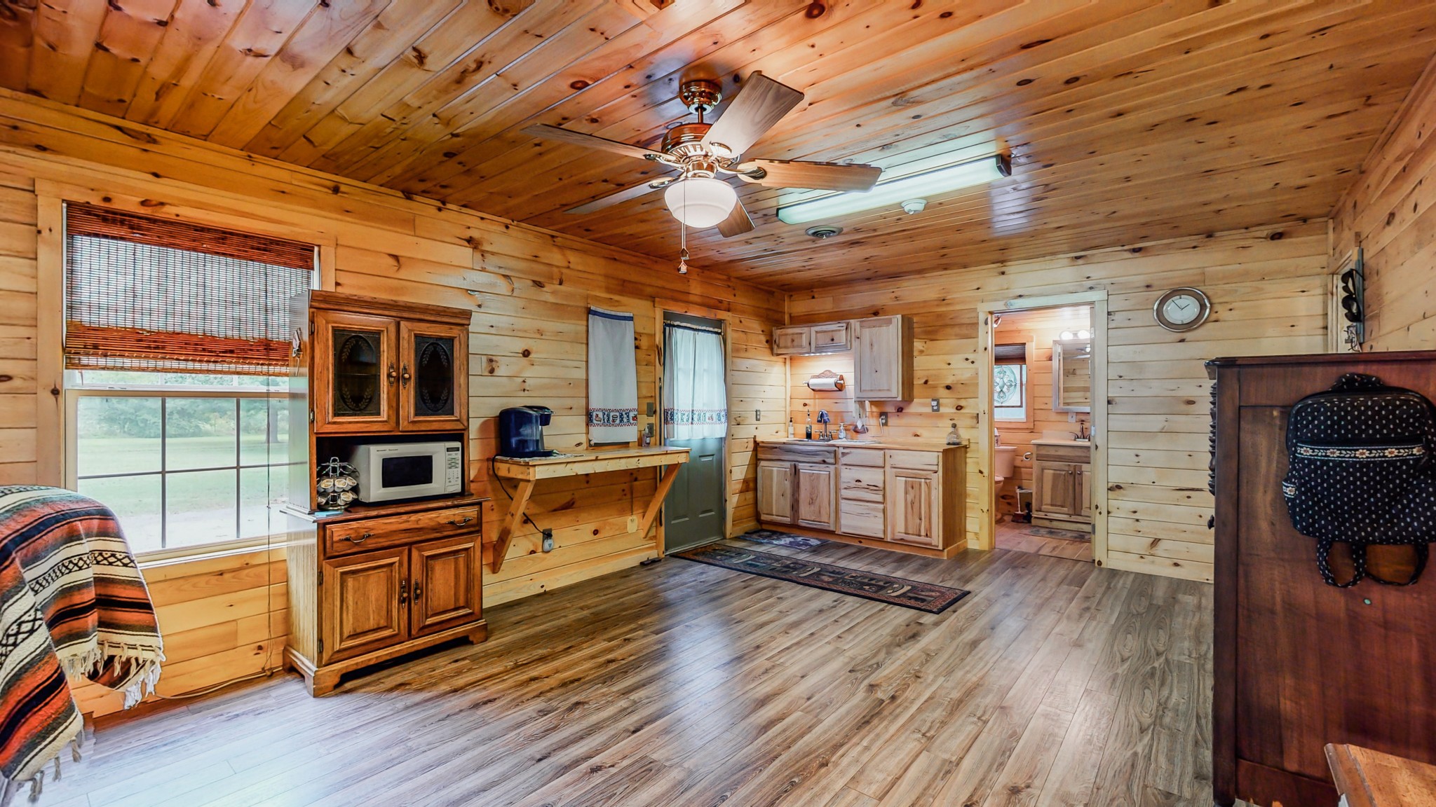1243 White Road Bon Aqua, TN 37025 - Photo 30 of 42 a kitchen with stove and wooden floor