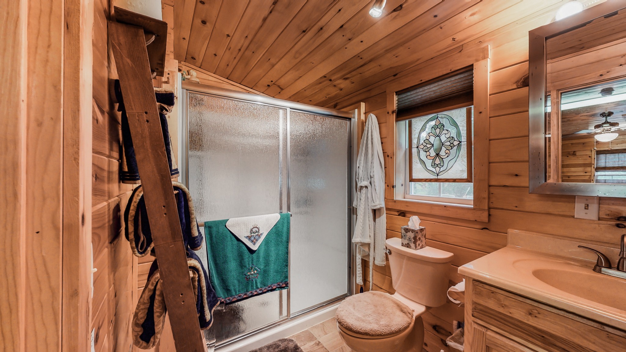 1243 White Road Bon Aqua, TN 37025 - Photo 33 of 42 a bathroom with a toilet and a shower