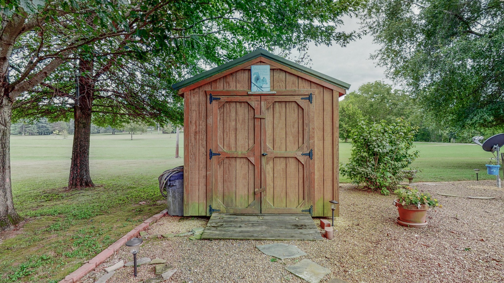 1243 White Road Bon Aqua, TN 37025 - Photo 38 of 42 a view of a small house with backyard