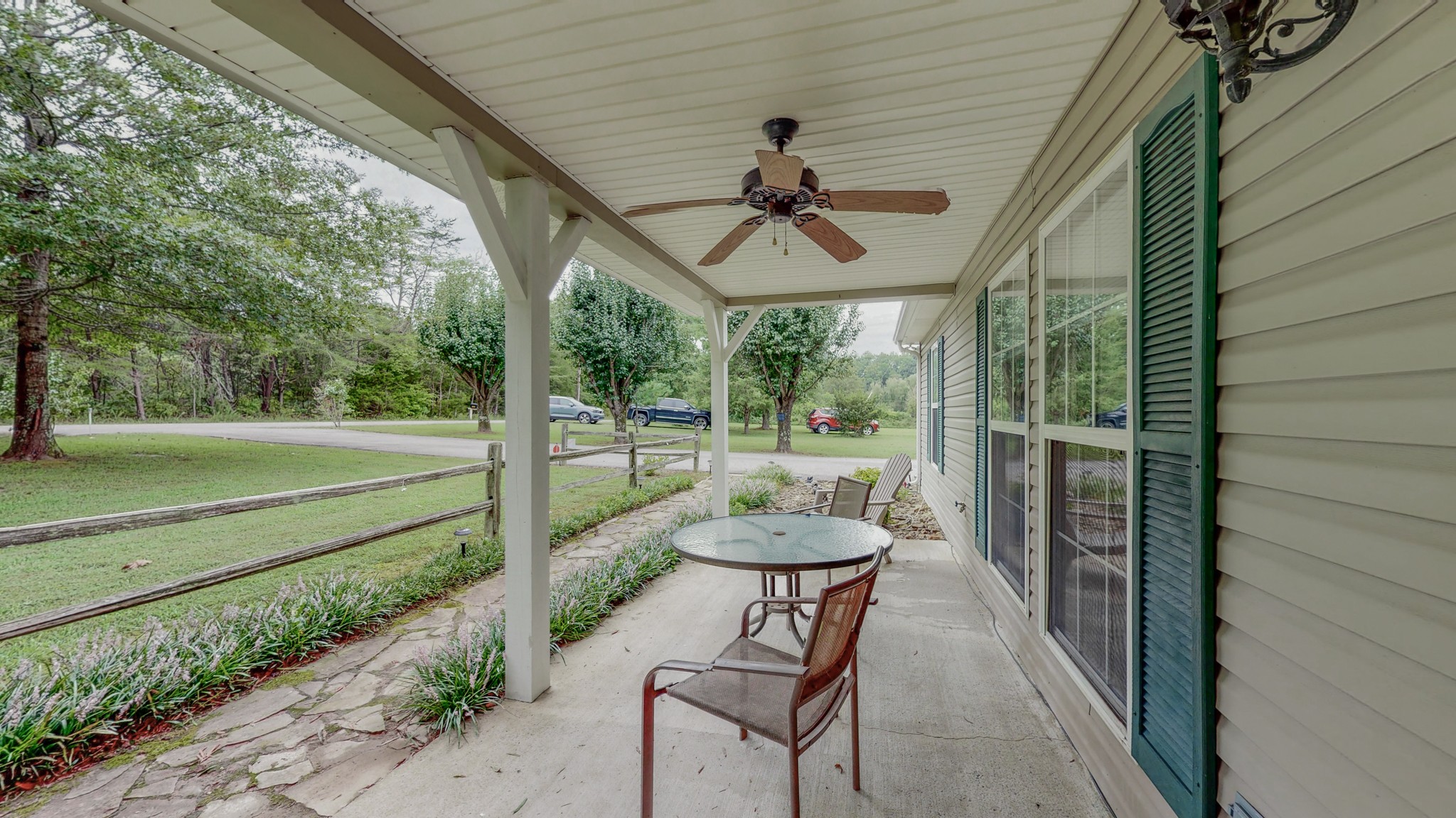 1243 White Road Bon Aqua, TN 37025 - Photo 42 of 42 a view of a porch with furniture and yard