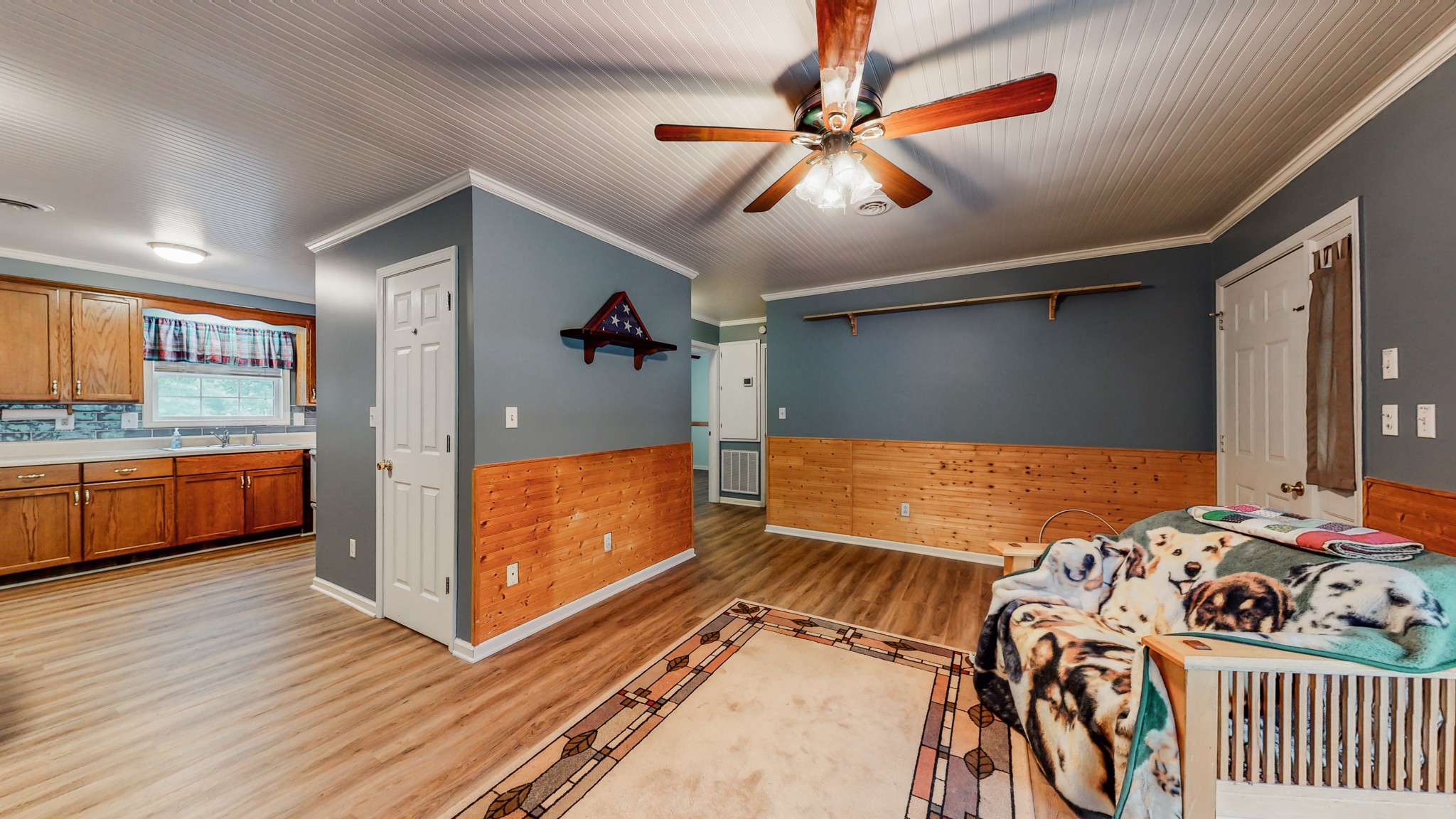 1243 White Road Bon Aqua, TN 37025 - Photo 9 of 42 a bedroom with a bed and a view of walk in closet