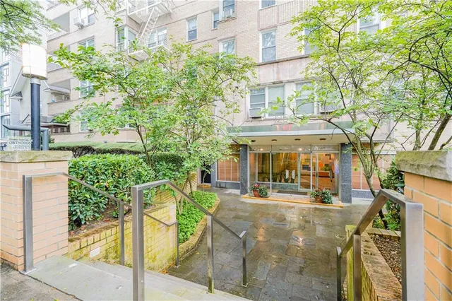 a view of a building with a garden