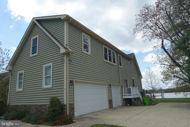 a front view of a house with a garage