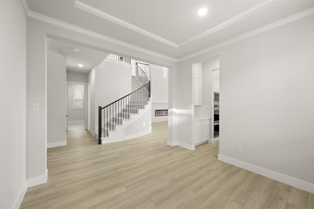 1104 Flock Drive Mansfield, TX 76063 - Photo 6 of 30 a view of entryway and hall with wooden floor