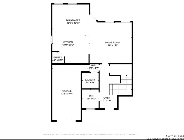 a picture of a bench in front of a wall