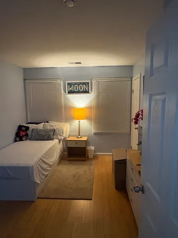 a bed room with a bed and a couch