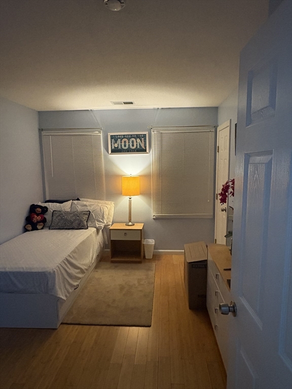 64 Wilmington Avenue Springfield, MA 01119 - Photo 19 of 29 a bed room with a bed and a couch