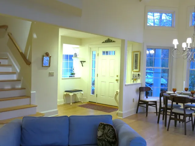 a bedroom with a bed and a table