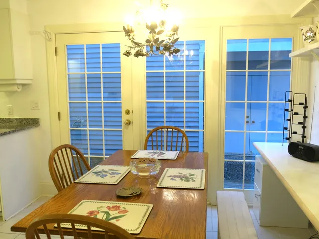 a view of a balcony and dining area