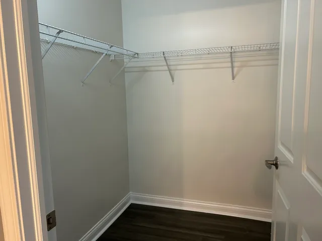 a view of a room with racks on the wall