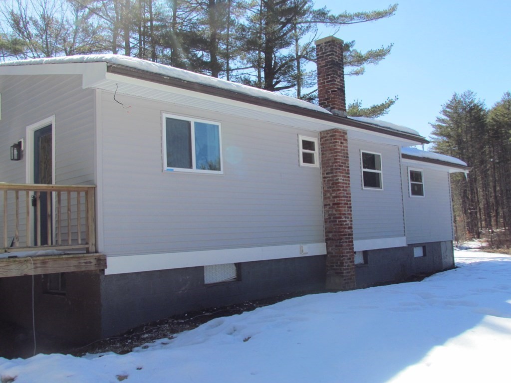 116 Williamsville Road Hubbardston, MA 01452 - Photo 5 of 27 a view of a house with a backyard