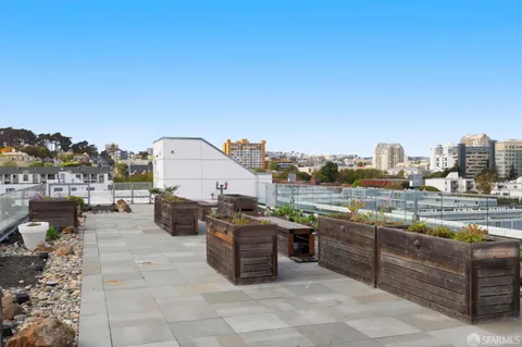 a view of a terrace with sitting area