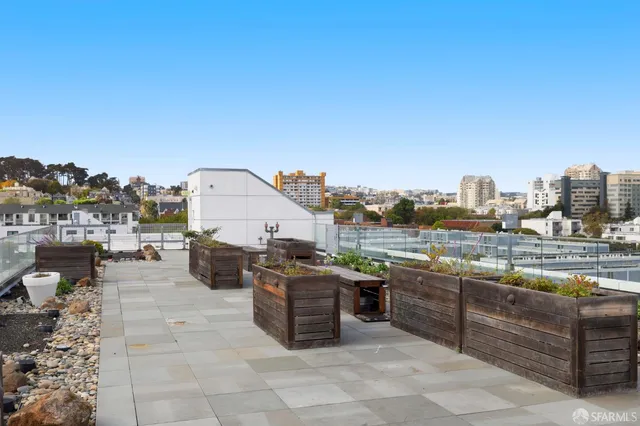 a view of a terrace with sitting area