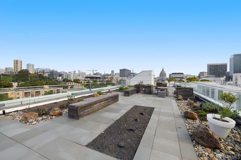 a view of city from terrace along with seating space