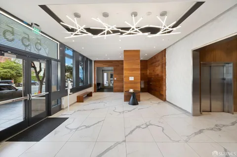 a view of an entryway with a chandelier