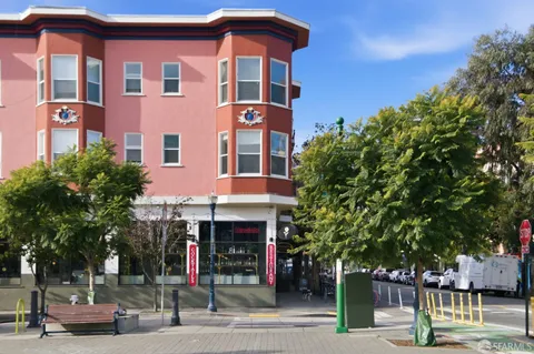 a front view of a building with street view